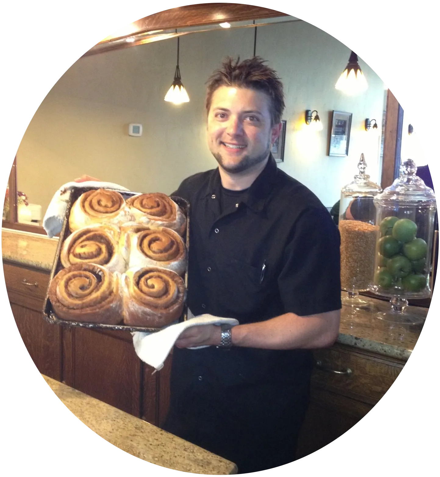 Ryan holding Cinnamon Rolls